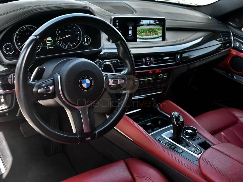 White BMW X6 M50i 2018 for rent in Dubai 3